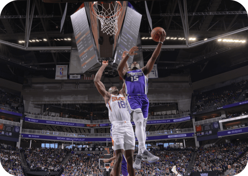Sacramento Kings player doing a lay up