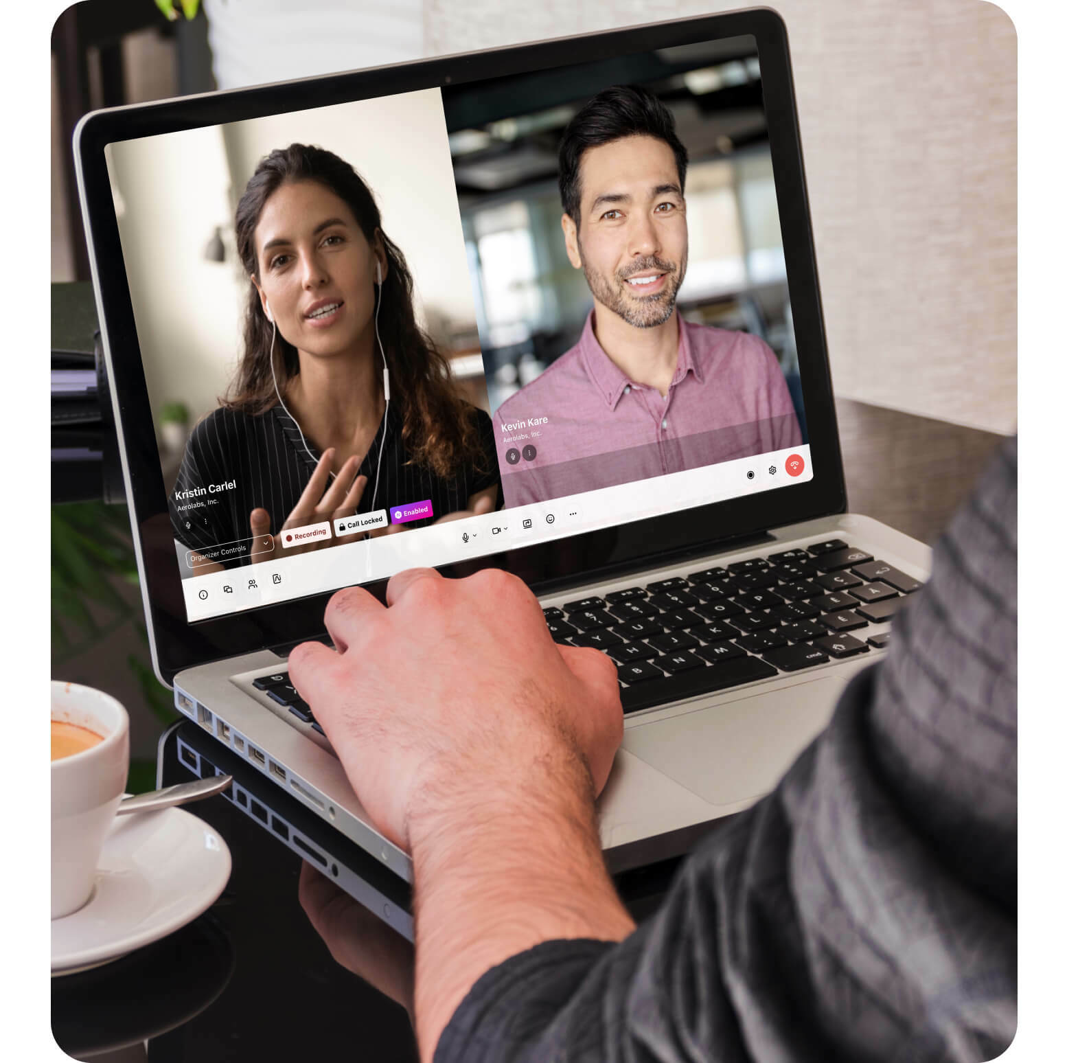 A person attending a video conference on laptop