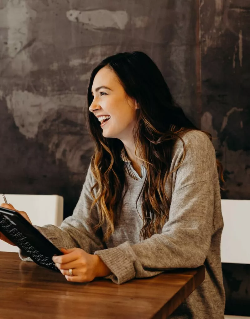 A woman taking down notes