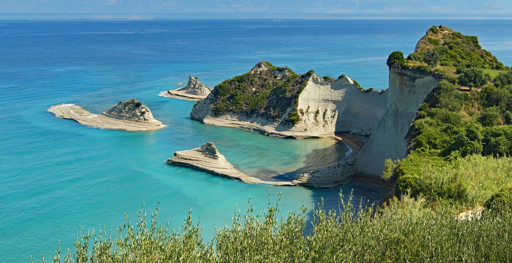 Beach with golden sand in Corfu