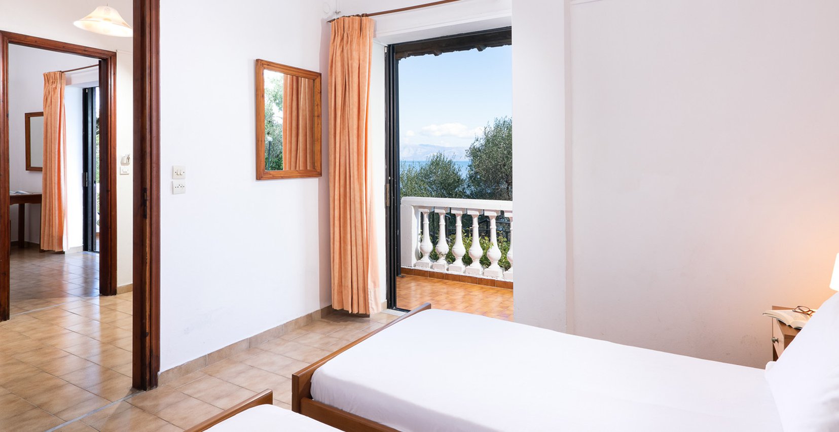 Dimitra Studios, bedroom with double bed and a balcony