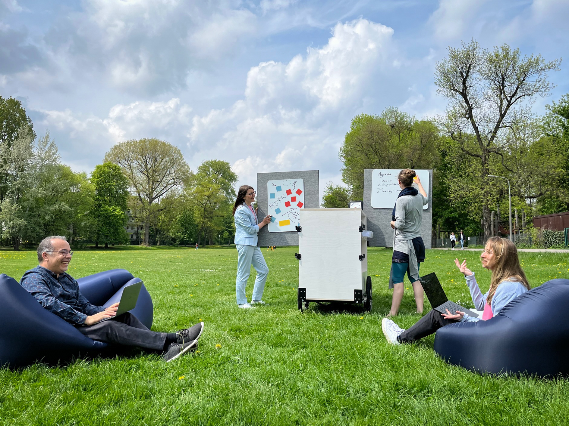Outdoor group discussion and brainstorming at DIVERSE project event.