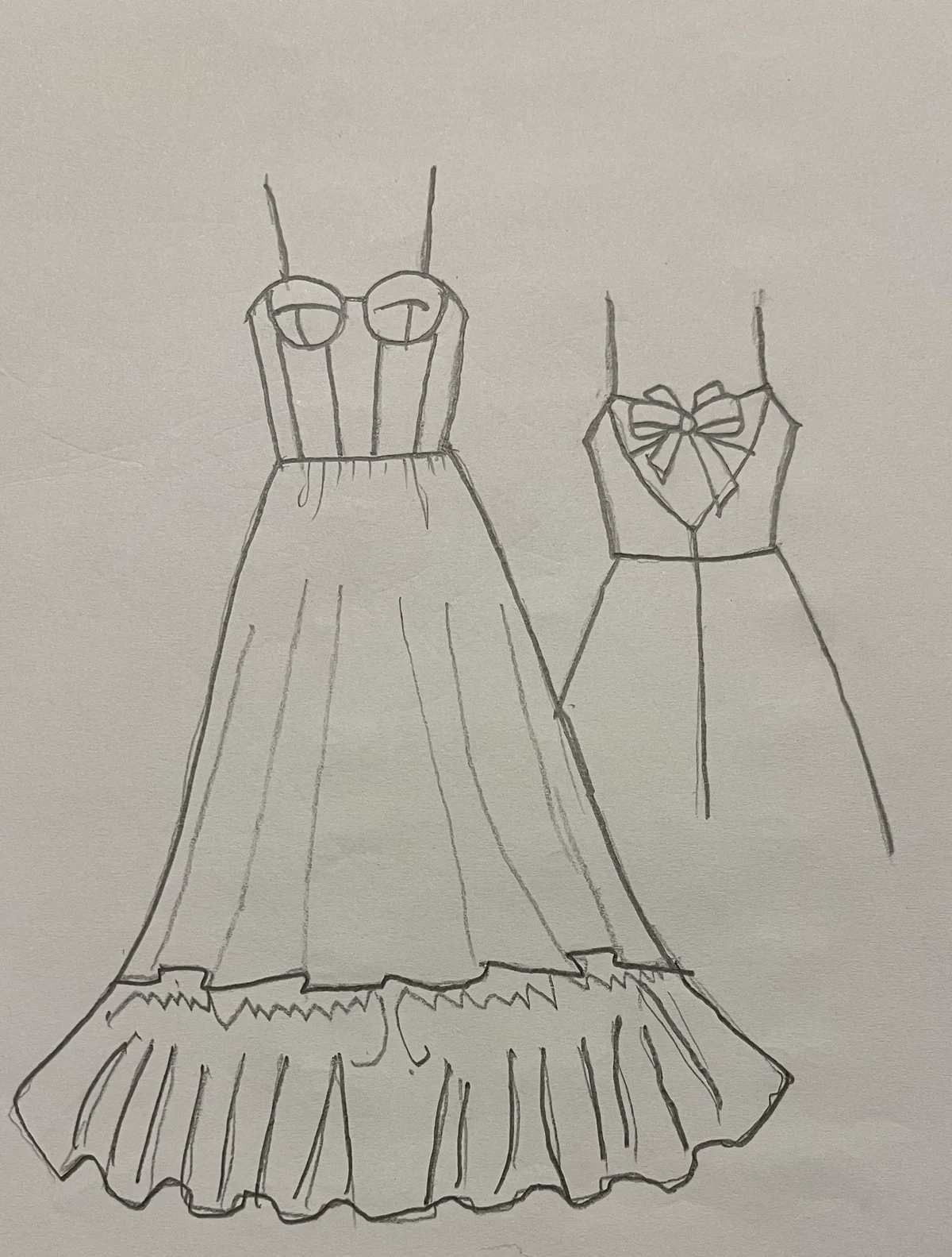 Hand-drawn front and back design sketch of the Pleated Dress on DIYO