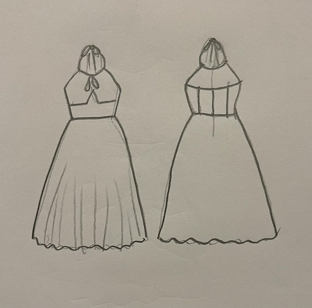 Hand-drawn front and back design sketch of the Wrap Mini Dress on DIYO