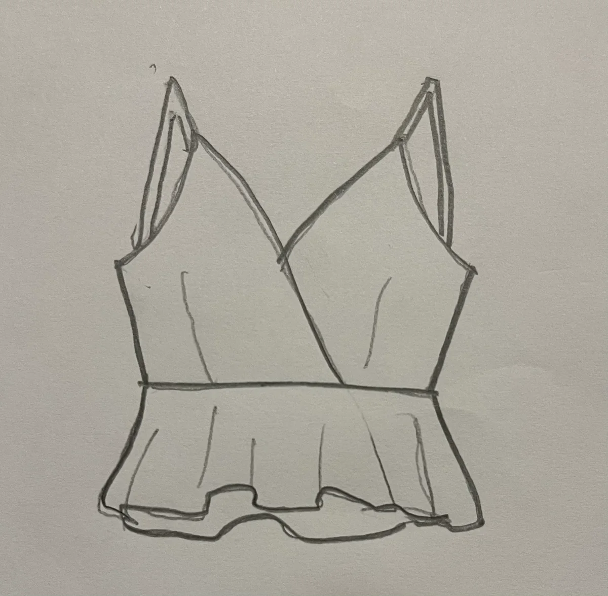 Hand-drawn front and back design sketch of the Embroidered Top on DIYO