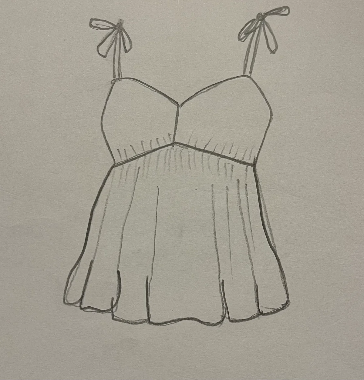 Hand-drawn front and back design sketch of the Backless Top on DIYO