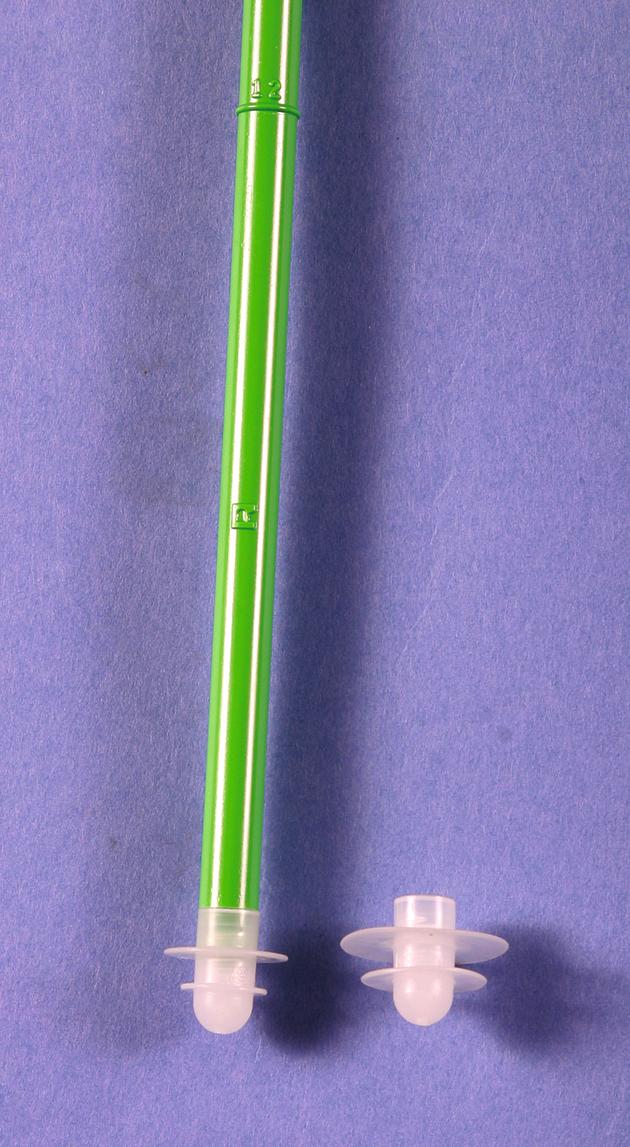 FIGURE 3.57, Occlusion of medullary canal. Plastic plug with flexible, thin flanges can be inserted to occlude medullary canal; plugs of several different diameters are available. They are screwed to end of calibrated rod for insertion to correct depth. SEE TECHNIQUE 3.6.