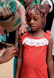 Fig. 1.30, Angolan child vaccinated during the 2016 yellow fever outbreak.