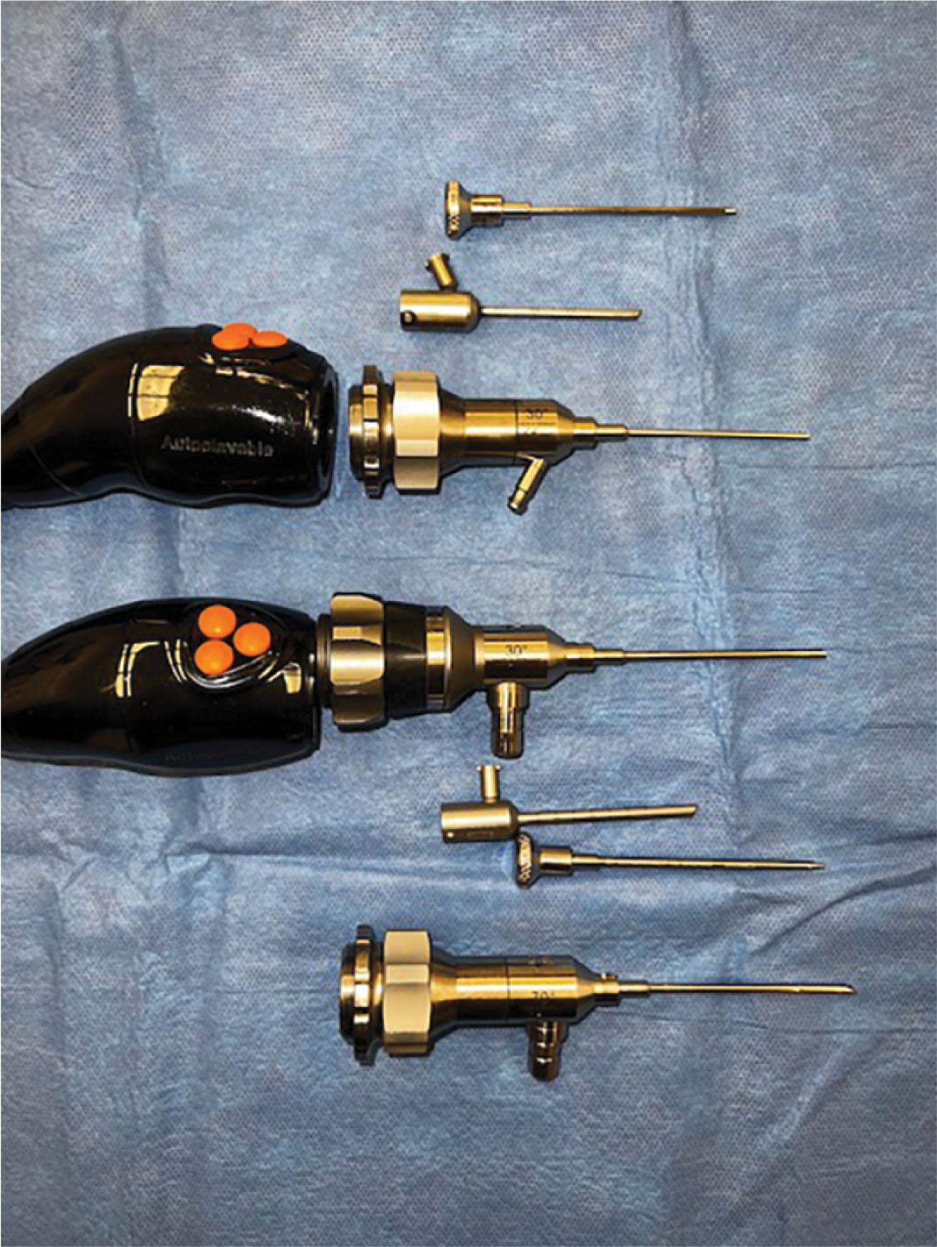 Fig. 39-1, Small-joint video arthroscopes including 1.9-mm arthroscope and cannulas, 30-degree 2.7-mm arthroscope with cannulas, and 70-degree 2.7-mm arthroscope.