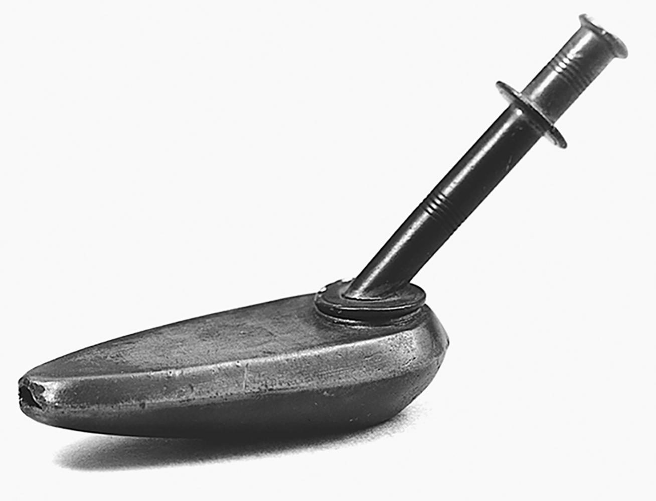 Fig. 1.2, Pewter pap spoon, circa ad 1800. Thin pap, a mixture of bread and water, was placed in a bowl. The tip of the bowl was placed in the child’s mouth. Flow could be controlled by placing a finger over the open end of the hollow handle. If the contents were not taken as rapidly as desired, one could blow down the handle.