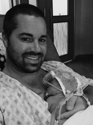 Fig. 8.2, Dad Nick and daughter Harper engaged in skin to skin.