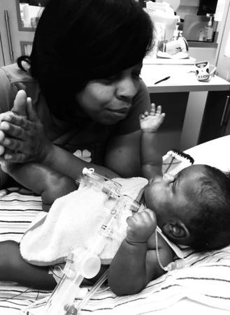 Fig. 8.3, Bonding opportunities with mom, Tere and daughter, Leah. Mutual reciprocity is promoted during massage and social engagement opportunities.