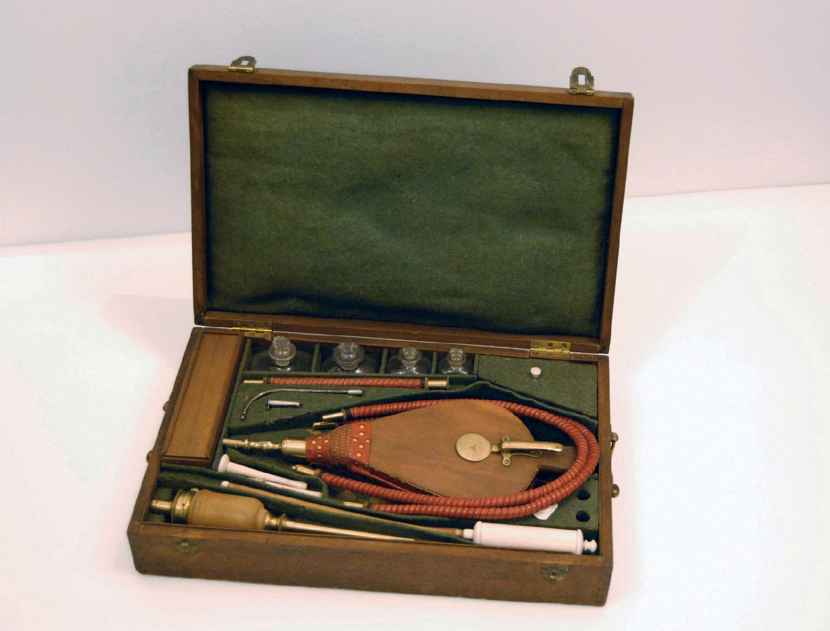 Fig. 17.2, Resuscitation set of Royal Humane Society on permanent loan to Association of Anaesthetists, London, showing curved metal tube for blind laryngeal intubation. (Photograph reproduced with the kind permission of The Association of Anaesthetists.)
