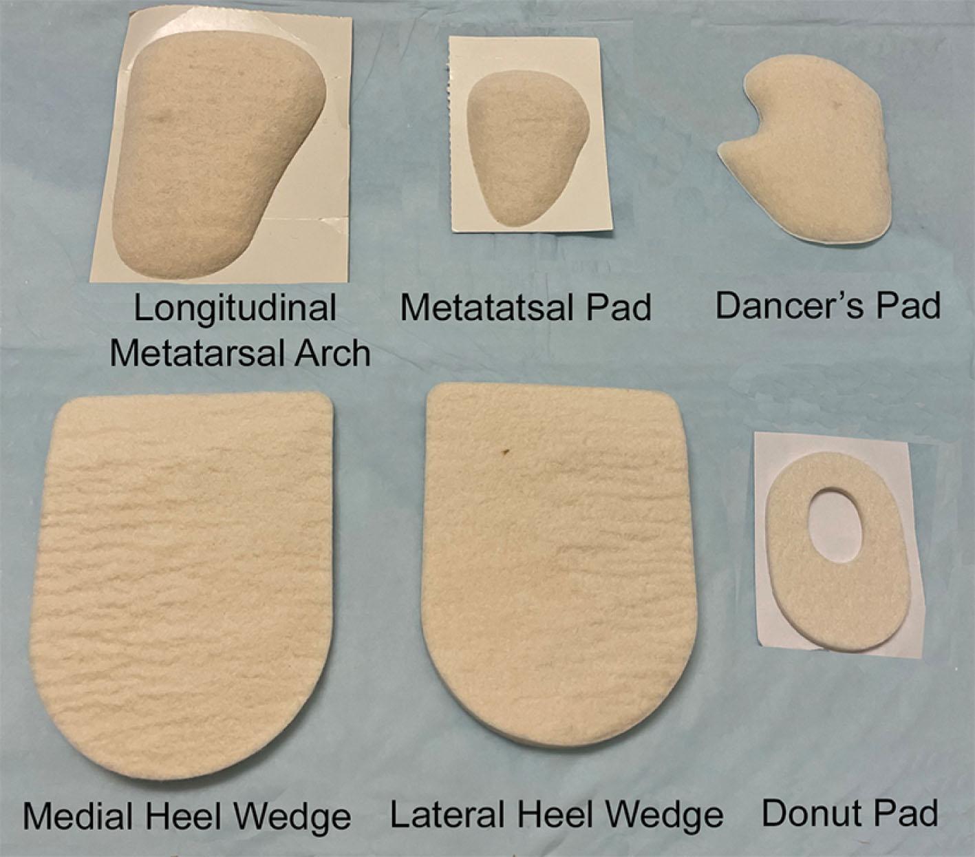 Fig. 13-13, Various types of soft felt supports that may be used to relieve pressure in the metatarsal area of the foot. The pads displayed are for the right foot.