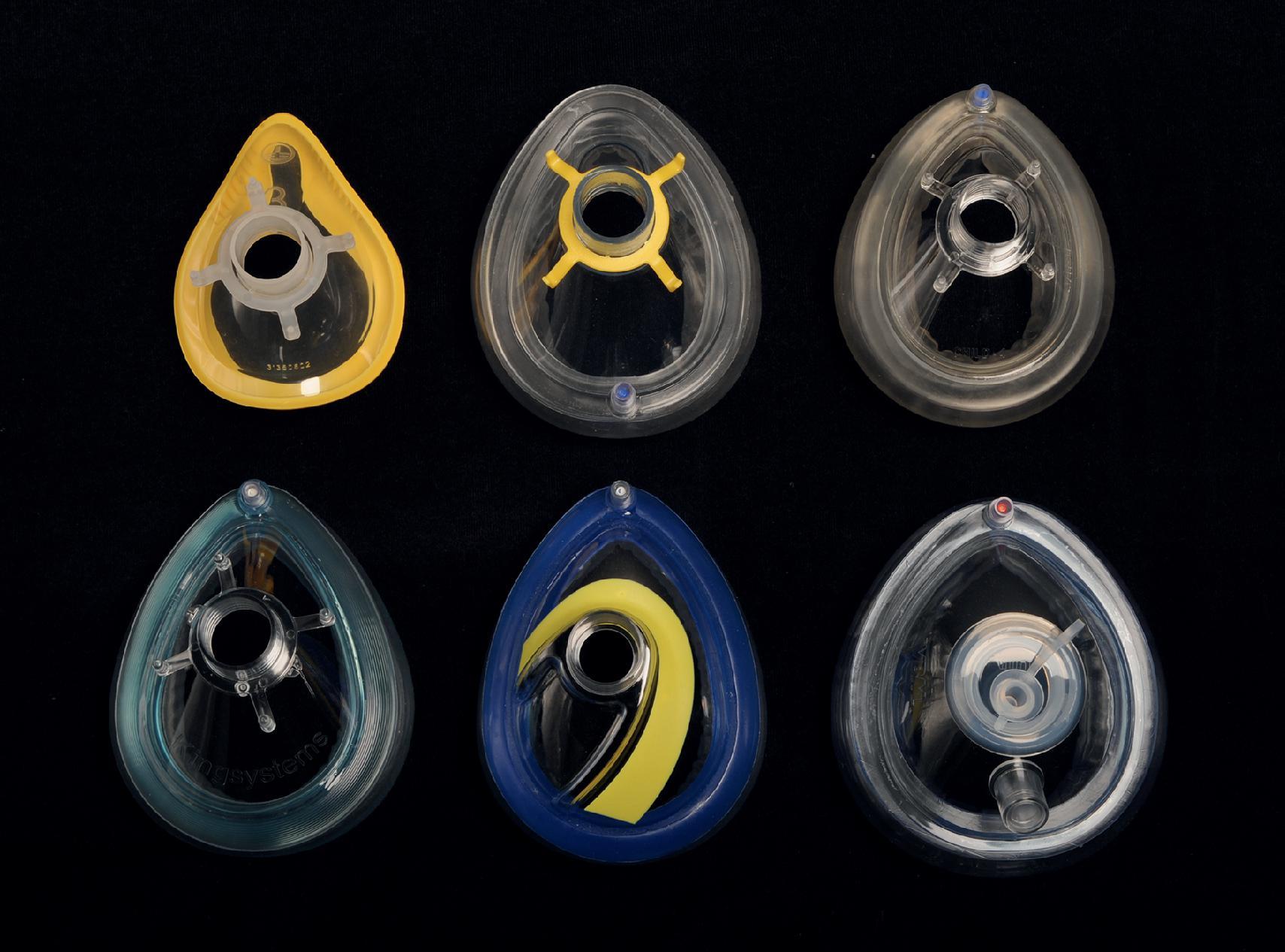 Fig. 18.7, Medium-size transparent disposable face masks. Top row, left to right: Face mask (FM) without inflatable cushion (Intersurgical Ltd., Wokingham, UK), FM with anterior inflation valve, and FM with posterior inflation valve. Lower row, left to right: generic symmetrical mask (King Systems/Ambu, Noblesville, IN, United States), asymmetrical ergonomic face mask (Tuoren Medical Group, Henan, China), and specialty endoscopy mask (VBM Medizintechnik, Sulz a. N., Germany).