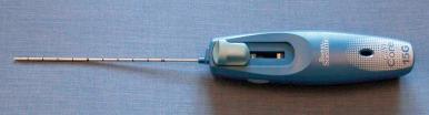 Figure 49-9, An automated 15-gauge core needle biopsy device.