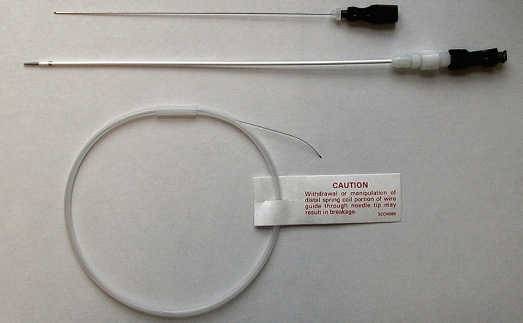 Fig. 100.5, An access set using a 22G Chiba needle and 0.018-inch wire.