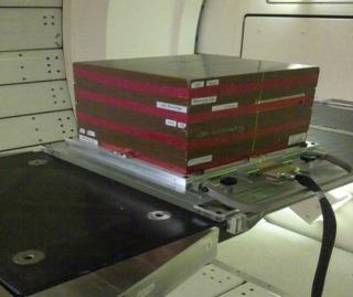 Fig. 6.1, Measurement setup with the tracker detector between buildup and the jig.