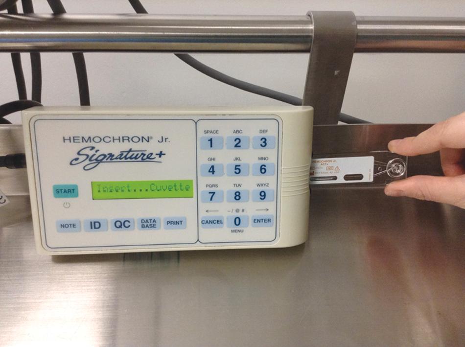 Fig. 14.3, Hemochron Junior with cassette.