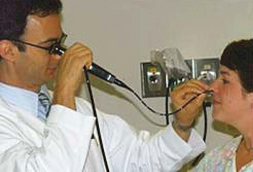 Figure 9-1, Nasal endoscopy may be performed with either a rigid or flexible telescope, and allows improved diagnosis in the evaluation of nasal obstruction.