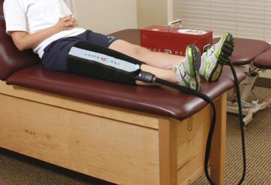 FIG 25-1, A clinical cryotherapy machine that provides compression with the cold program (Game Ready) is used in the initial postoperative period.