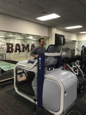 Fig. 30.3, Athlete on the Alter-G™, anti-gravity treadmill.