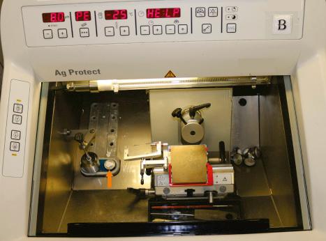 Fig. 2.15, Cryostat with tissue on freezing stage ( arrow ).