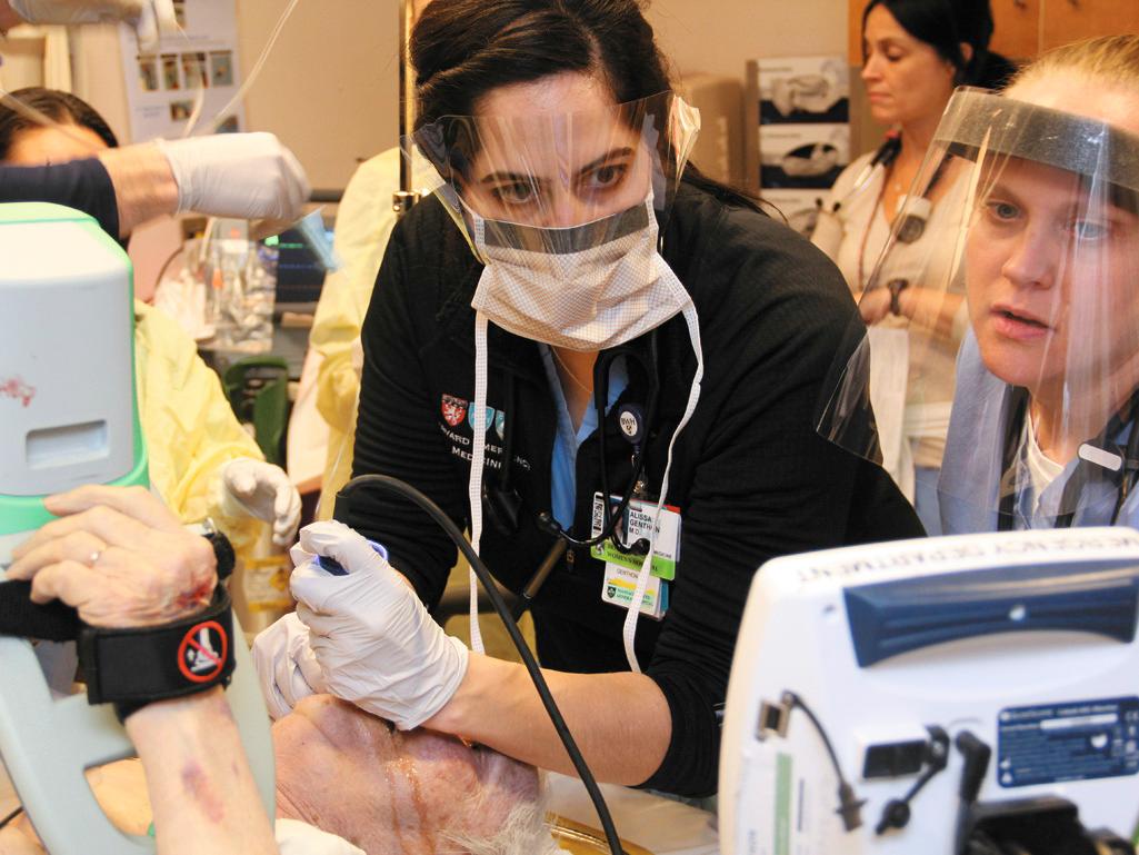 Figure 68.2, A mask and protective eyewear are mandatory when exposure to body fluid aerosols is possible. A gown is also suggested. This patient vomited profusely during intubation, which may have led to an exposure if proper protective gear had not been worn.