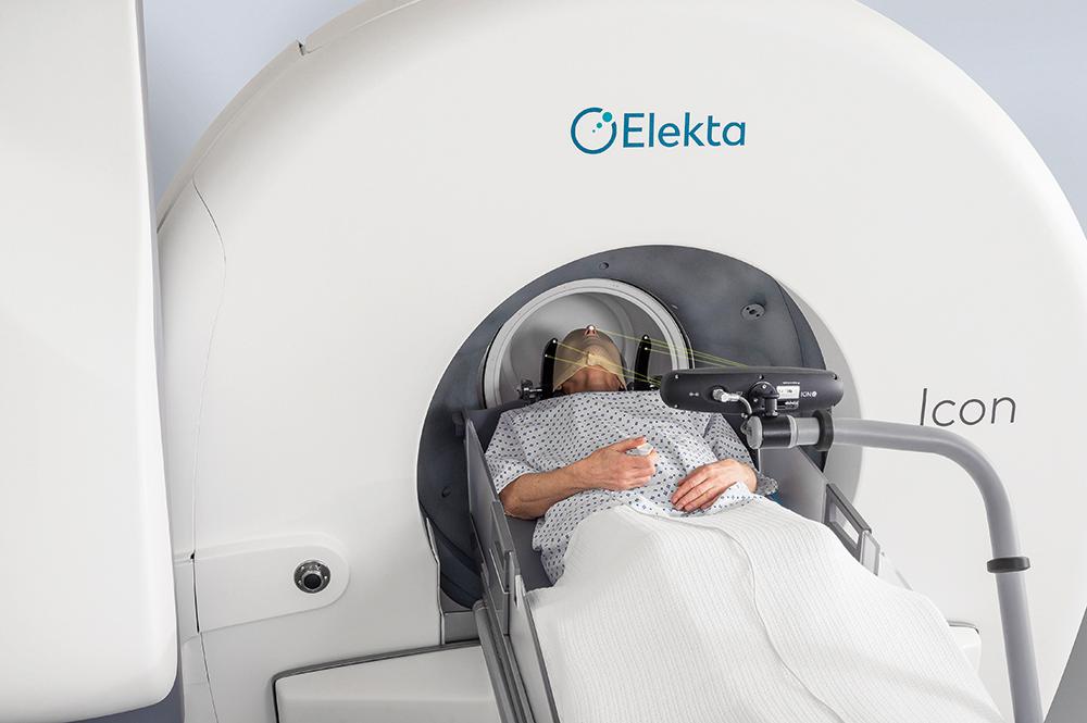 Fig. 59.4, The Leksell Gamma Knife Icon with the mask-based frameless treatment option shown. Note the real-time motion management system using infrared cameras with a resolution of 0.15 mm.