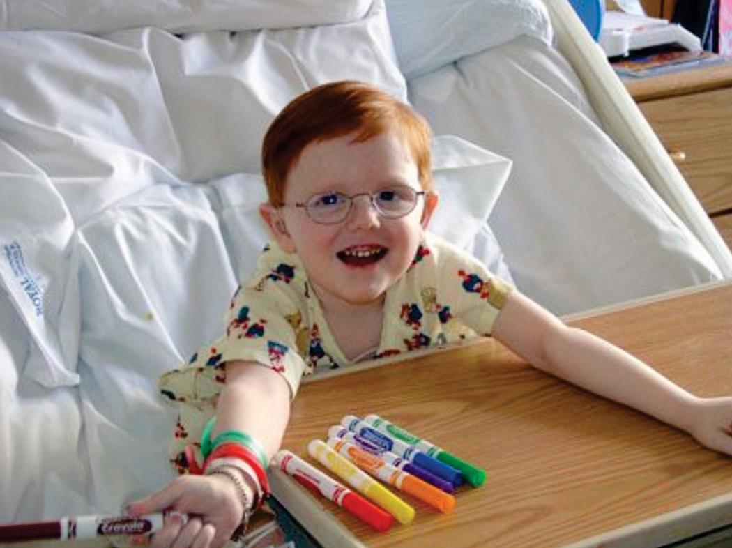 Fig. 4-1, Matthew enjoying an art project in the hospital.