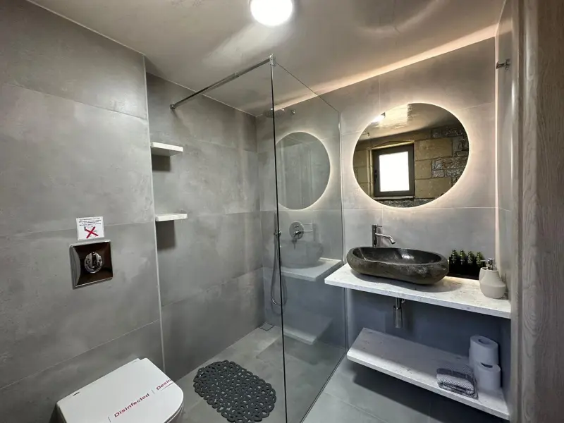 FINIKES APARTMENTS - ΠΕΤΡΟΧΤΙΣΤΕΣ ΜΟΝΟΚΑΤΟΙΚΙΕΣ