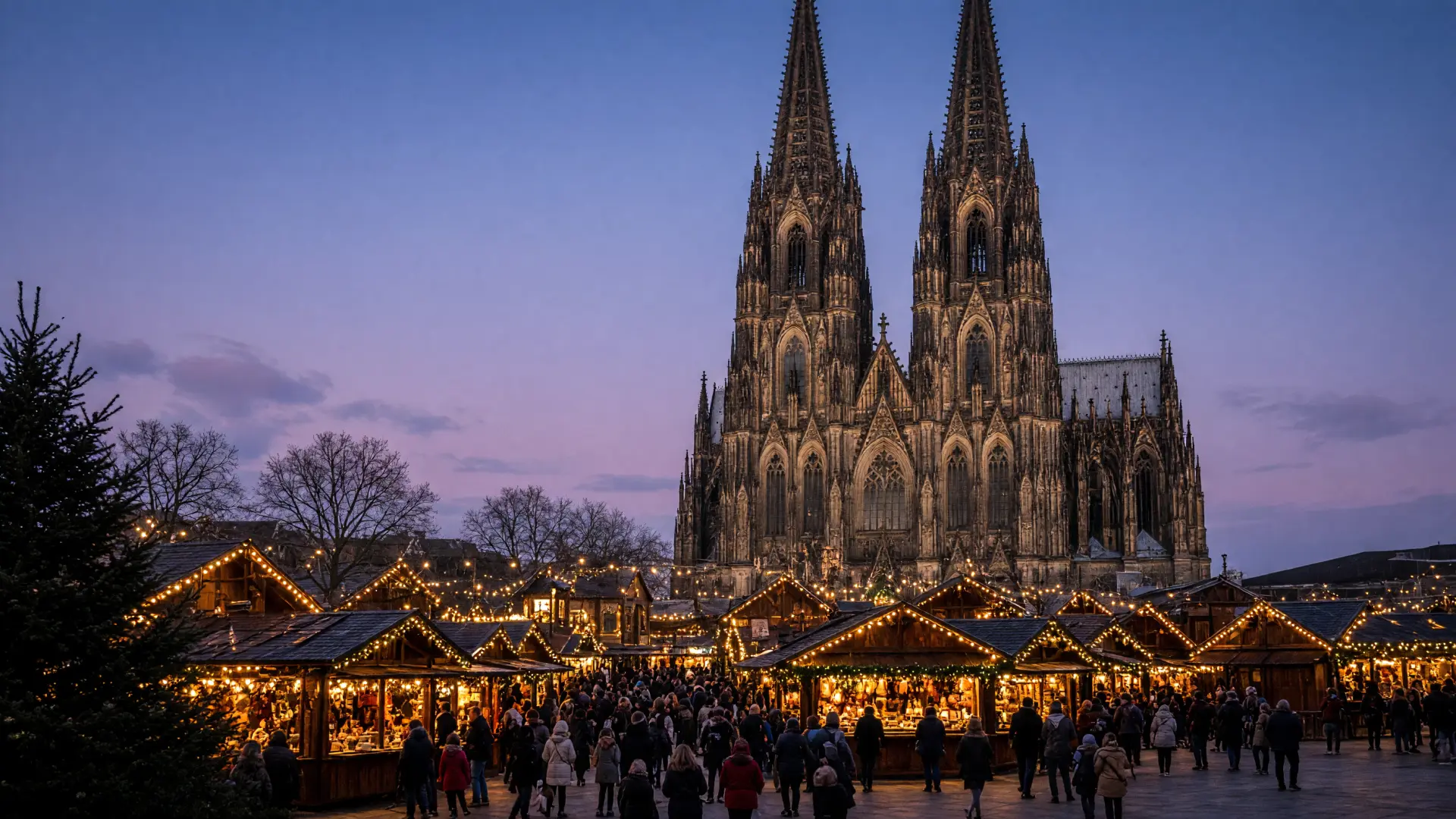 Kerstmarkt voor de Dom van Keulen bij valavond