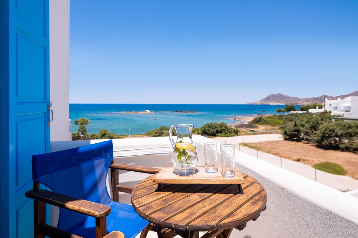 Domus Litus Deluxe Studio balcony with sea view and little table.