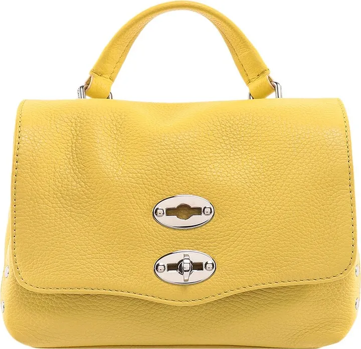 Leather handbag with metal studs