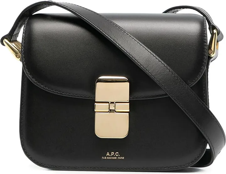 Shoulder bag made of smooth cowhide featuring a contrasting logo printed on the front.