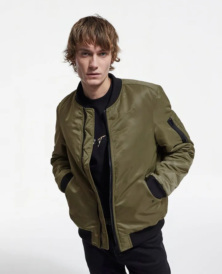 Khaki bomber jacket with leopard lining