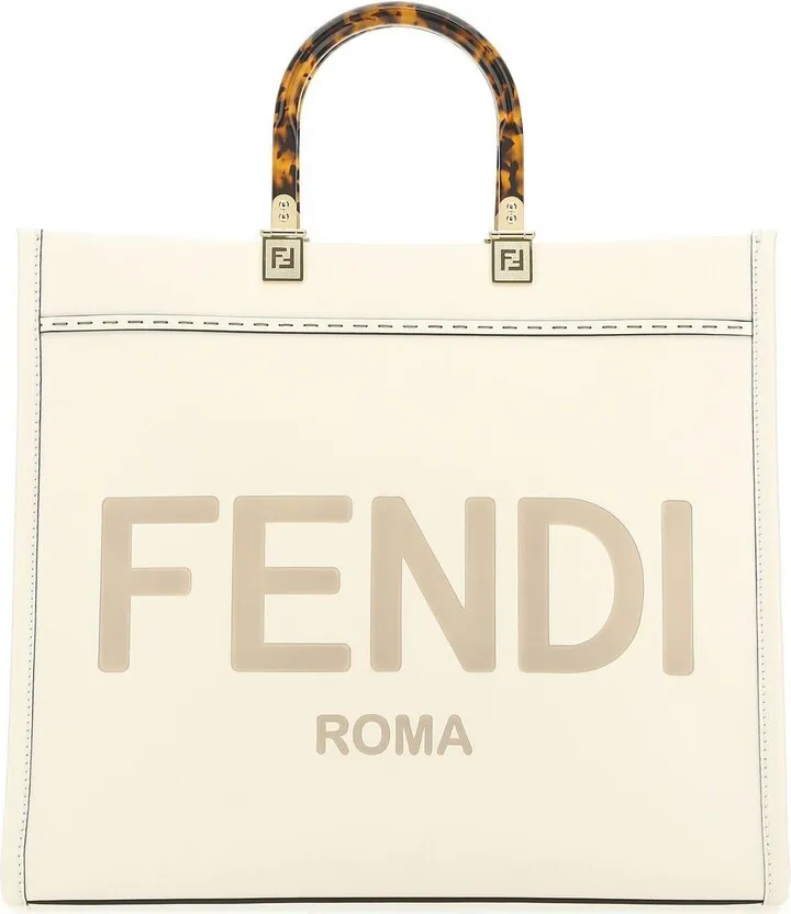 Shopping bag realized in smooth King calf leather characterized by embossed logo at the front.