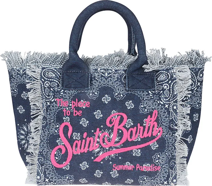 Medium size bag with small handles and zip closure Small document pocket inside Surrounded by fringe and decorated with an embroidered logo Colour: blue