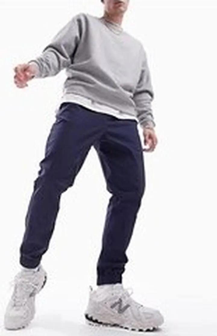 ASOS DESIGN tapered chino sweatpants with elastic waist in navy