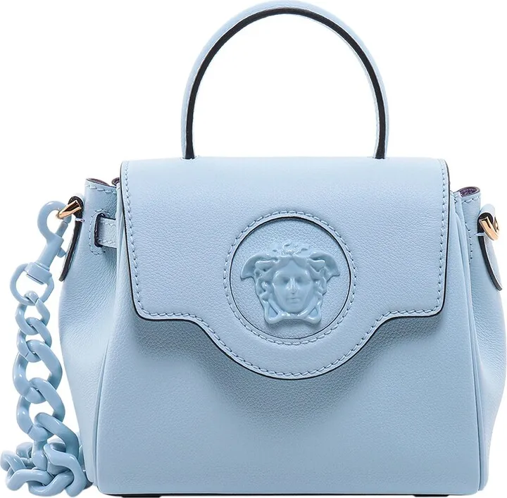 Leather handbag with embossed logo