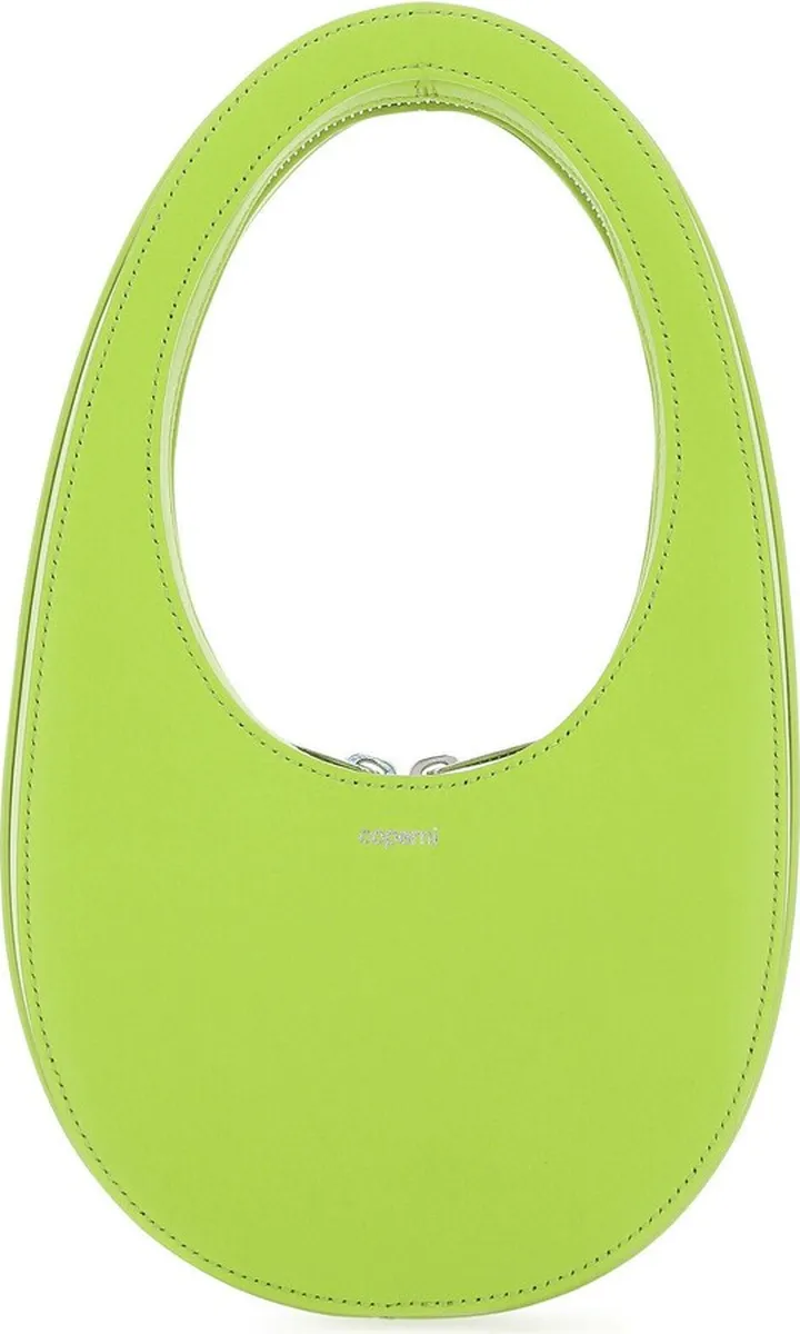Handbag realized in smooth calf leather characterized by contrasting printed logo at the front enriched by logoed label on the side.