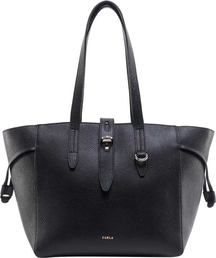 Leather shoulder bag with engraved logo