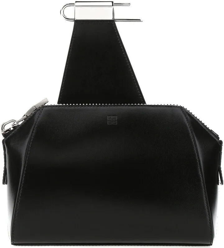 Crossbody bag realized in smooth calf leather characterized by embossed 4G motif at the front.