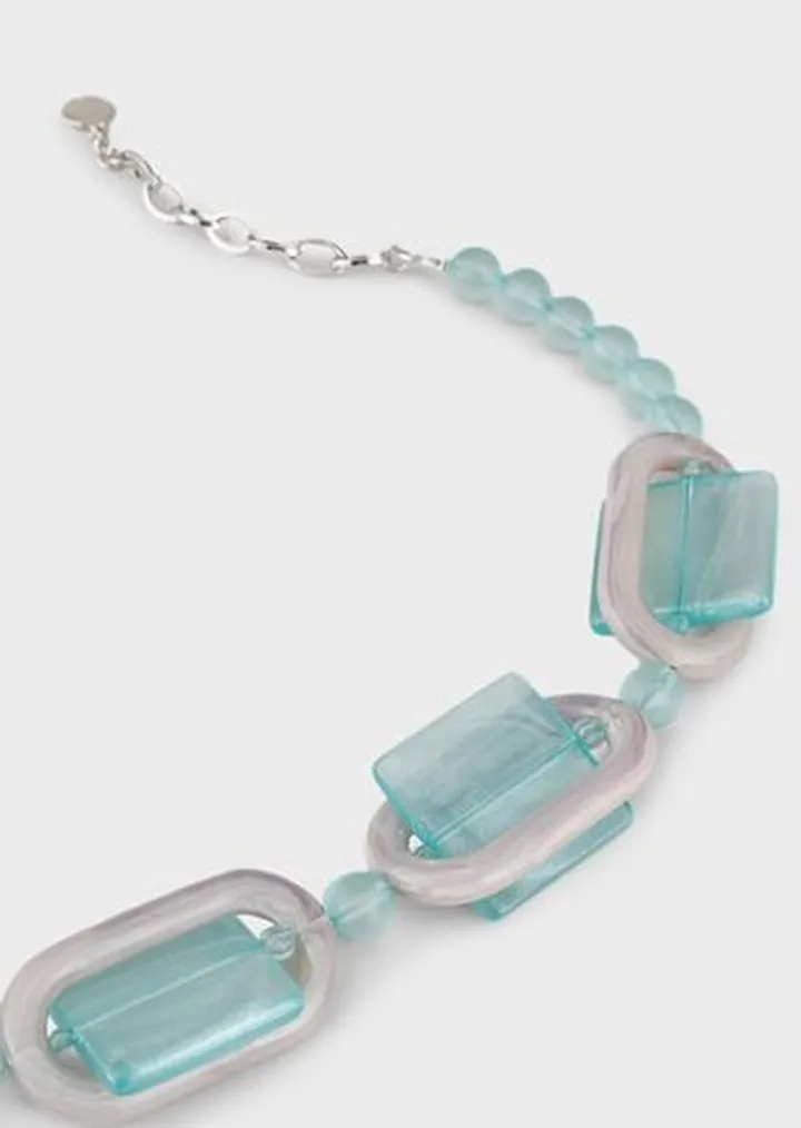 Necklace with plexiglass spheres and geometric details