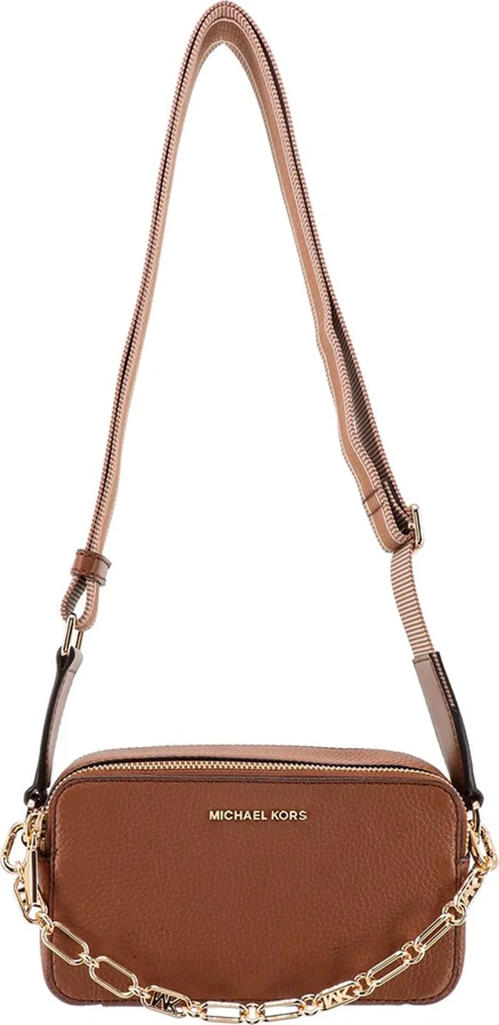 Leather handbag with metal logo on the front
