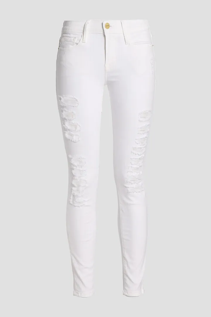 Distressed mid-rise skinny jeans