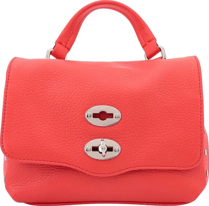 Leather handbag with metal studs