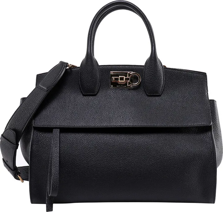 Hammered leather handbag with engraved logo
