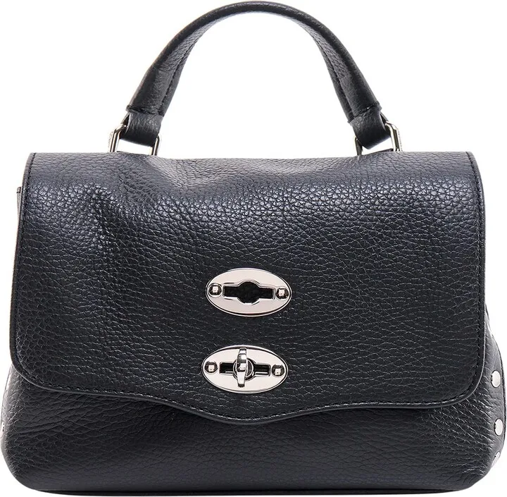 Leather handbag with metal studs