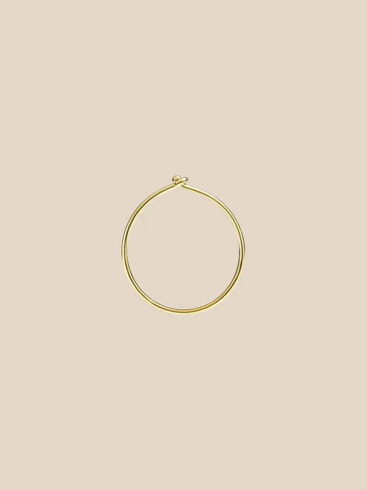 Small Dodo hoop earring in 18 kt yellow gold